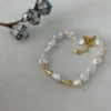 Baroque Pearl Bracelet โ Gold baroque freshwater pearl bracelet with gold-tone accents