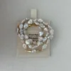 baroque freshwater pearl necklace with gold clasp on pouch