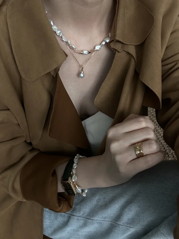 baroque freshwater pearl necklace layered on model