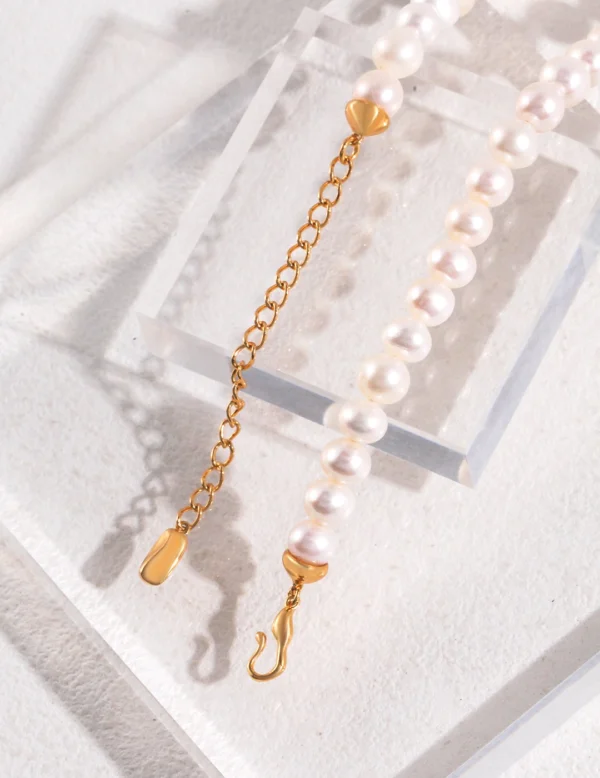 gold hook clasp and extender on French natural pearl necklace