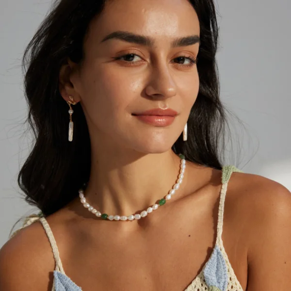 Green jasper pearl necklace worn with matching pearl earrings