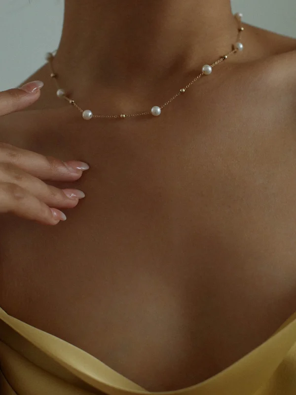 Gypsophila Necklace Flat Lay – Gold gypsophila freshwater pearl necklace gold vermeil flat lay