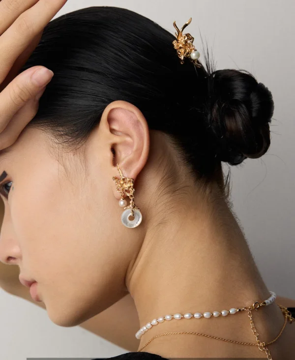 antique gold retro pearl drop earrings styled on model