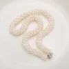 white freshwater pearl necklace with silver lantern clasp