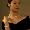 White Pearl Twist Set on Model white freshwater pearl twist braided necklace and matching bracelet