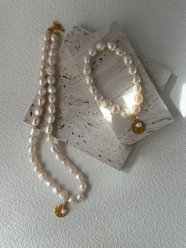 baroque pearl bracelet and matching necklace with gold coin charms