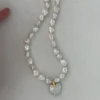 heart-shaped baroque pearl necklace with gold heart pendant and freshwater pearls