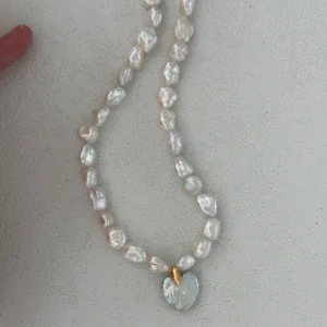 Heart-Shaped Baroque Pearl Necklace heart-shaped baroque pearl necklace with gold heart pendant and freshwater pearls
