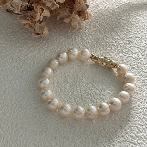 natural threaded baroque freshwater pearl bracelet with gold clasp