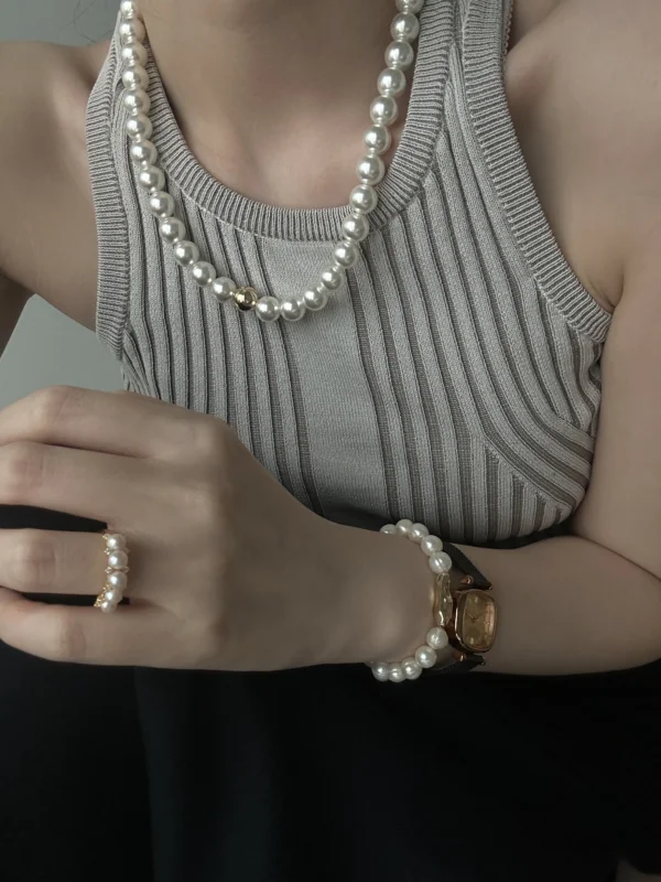 baroque freshwater pearl bracelet on wrist with watch