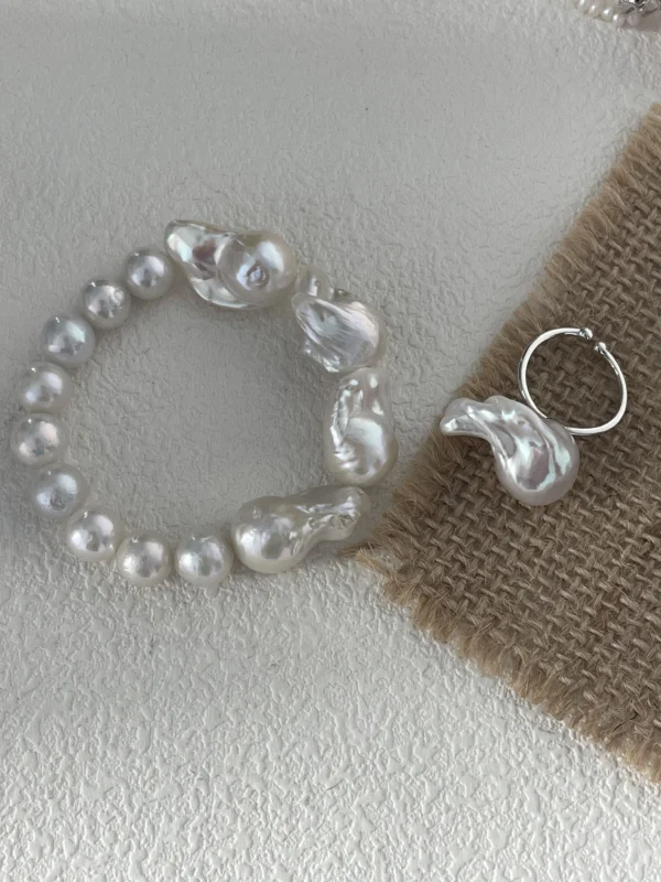 Detail of baroque freshwater pearls in mixed sizes on a bracelet