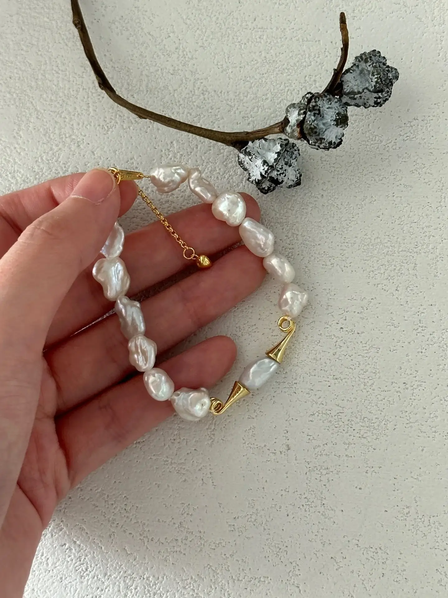Baroque pearl bracelet worn on wrist