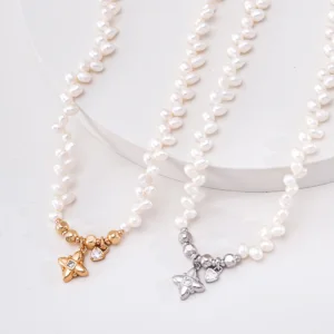 Freshwater pearl necklace with CZ charms in polished silver and gold-plated finishes