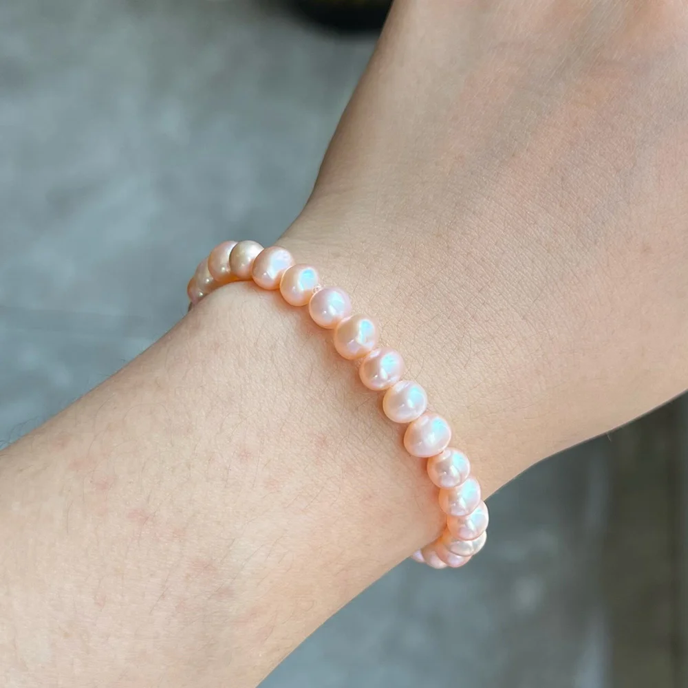 5mm pink pearl bracelet worn on the wrist