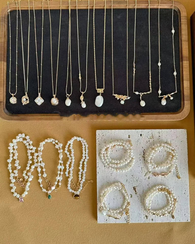 Pearl necklaces and bracelets showing different pearl sizes for jewelry guide